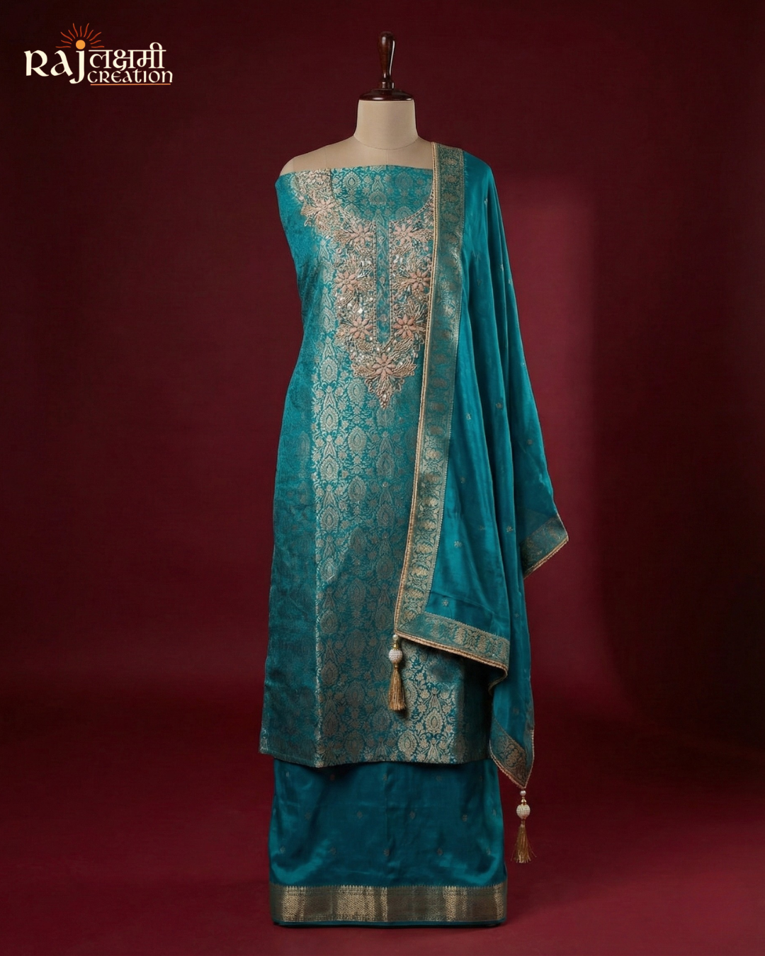 Turquoise Treasure: Hand-Embroidered Zardosi Tissue Upada Suit